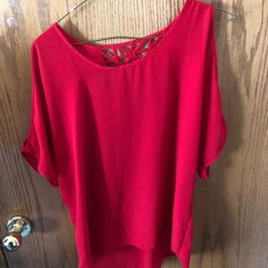 Red shoulder cut shirt